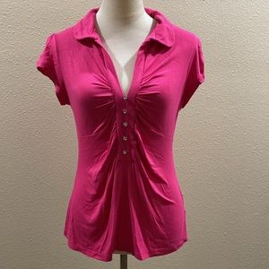 Hot pink V neck blouse made of very soft cotton. With rhinestone buttons
